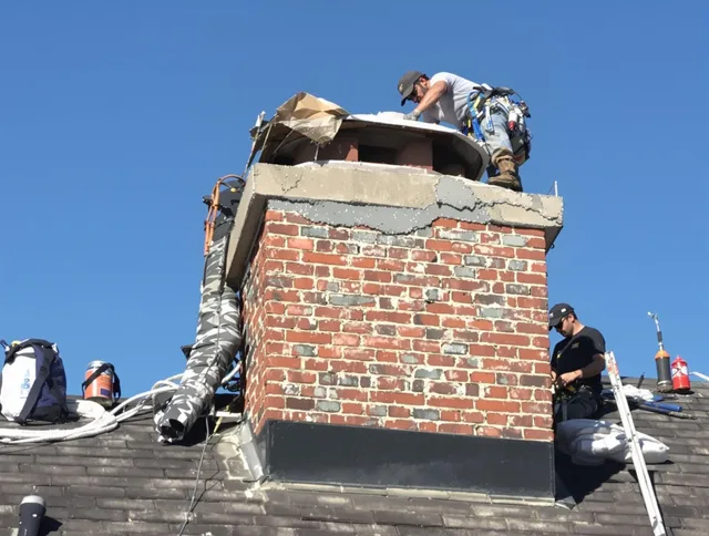 Melbourne Chimney Sweep installing a custom chimney crown in Melbourne, FL