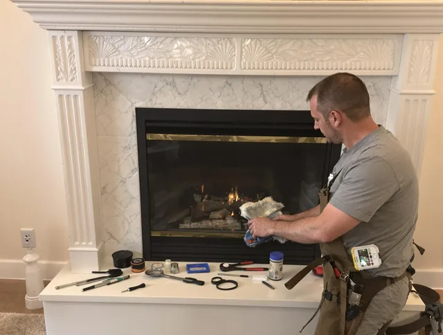 Melbourne Chimney Sweep performing fireplace maintenance in Melbourne, FL
